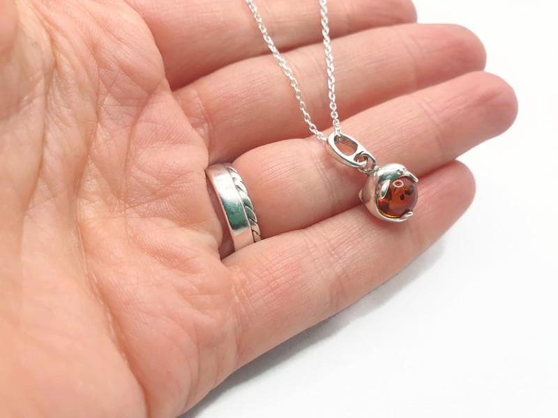 Amber Dolphin Pendant – Baltic Amber Jewelry with Honey Cognac Bead & Sterling Silver Necklace