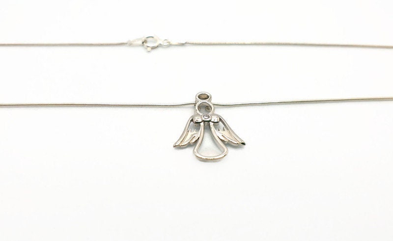 Sterling Silver Angel Pendant Necklace: Cubic Zirconia, Rhodium Plated
