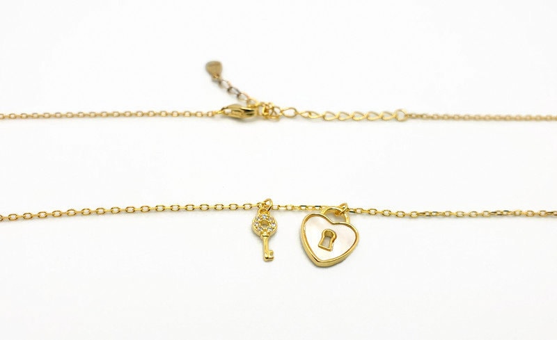 Gold Plated Silver Key and Nacre Heart Lock Necklace: Cubic Zirconia Charm