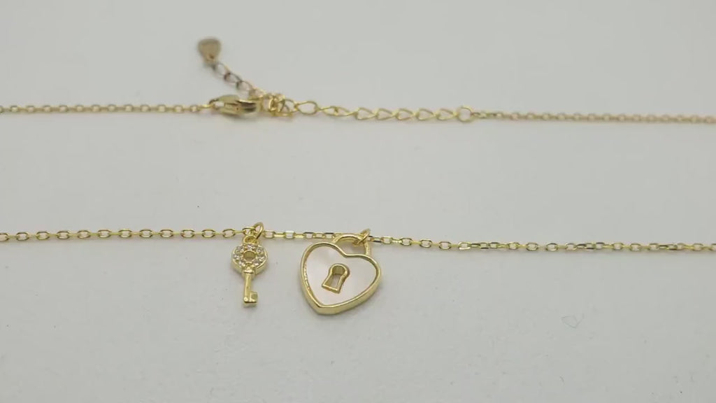 Gold Plated Silver Key and Nacre Heart Lock Necklace: Cubic Zirconia Charm